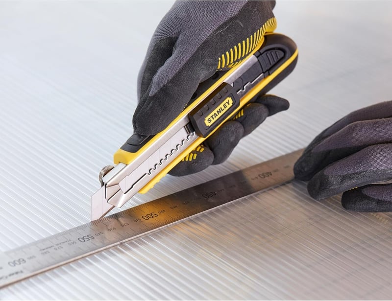 Stanley FatMax Cuttermesser 18mm - Profi Teppichmesser mit Klingenbrecher
