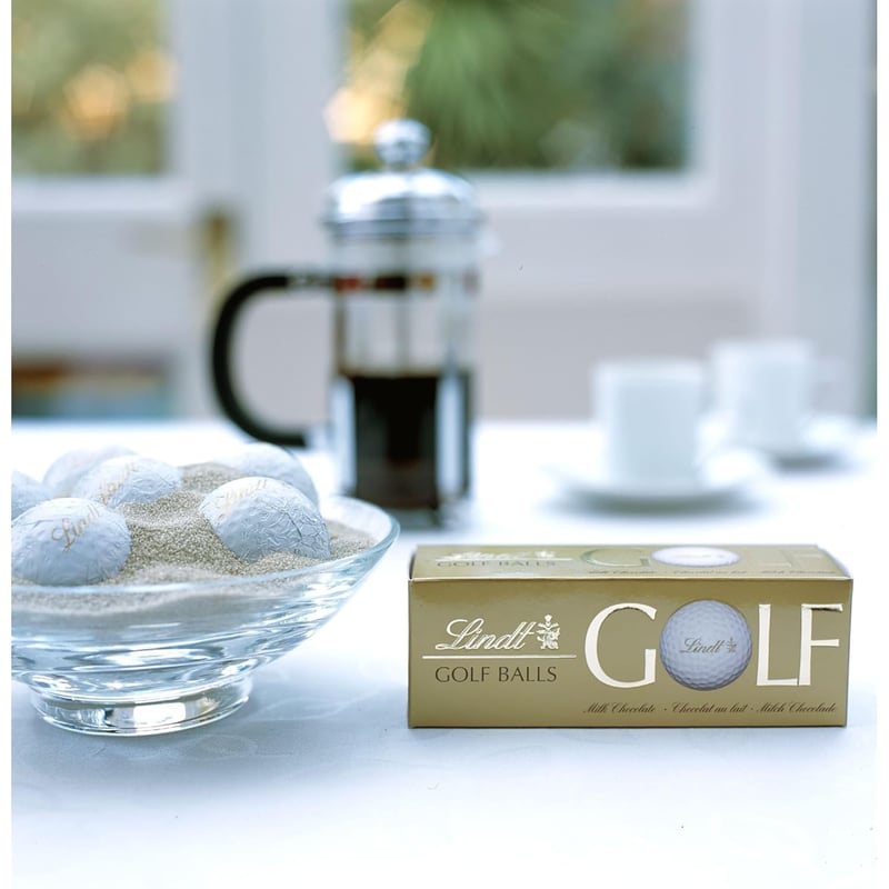 Lindt Pralinengeschenk mit Golfbällen aus Vollmilchschokolade, 110 g