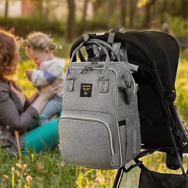 Baby Wickelrucksack mit großem Fassungsvermögen und tragbarem Wickelunterlage für Eltern