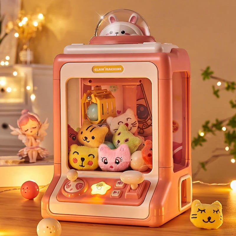 Mini Klauenmaschine für Kinder mit Musik – rosa Greifspielzeug für Partys