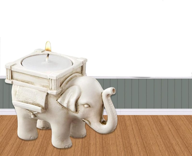 Elfenbeinfarbene Teelichthalter im Elefanten-Design, 2er Set