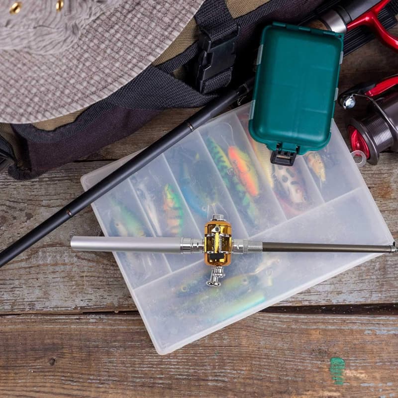 Mini Engel mit goldener Angelrolle in silbernem Stift