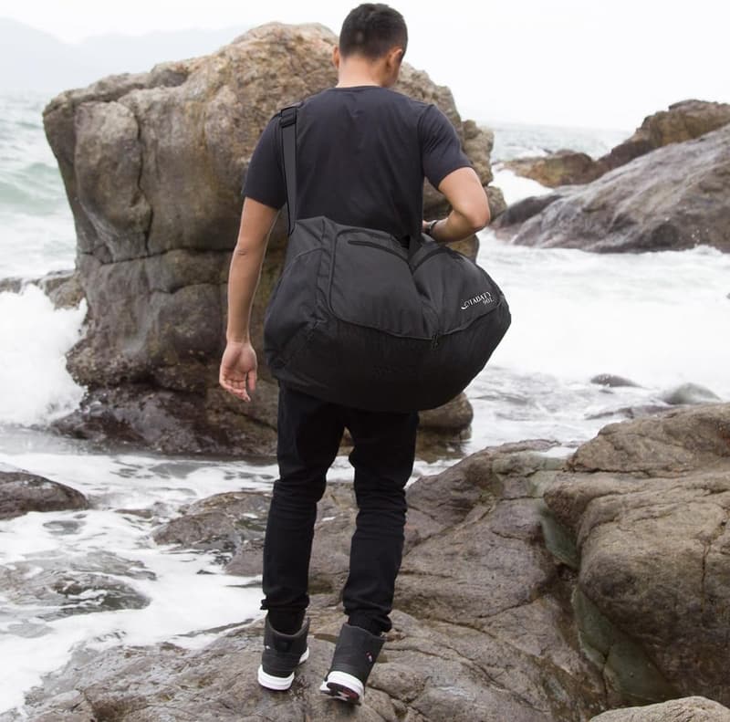 Faltbare 90L Reisetasche für Frauen und Männer – Schwarz mit mehreren Taschen