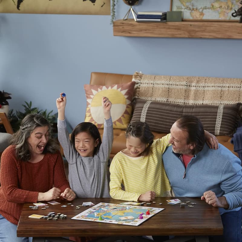 Family Game Night: Monopoly World Tour Board Game with Token Stampers