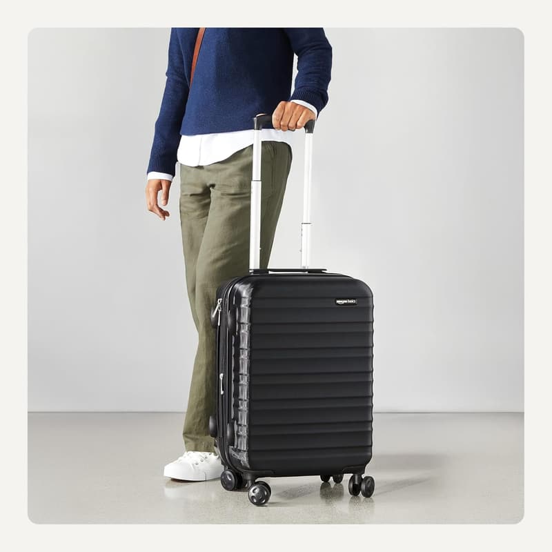 Expandable Black Hardside Checked Luggage with Wheels