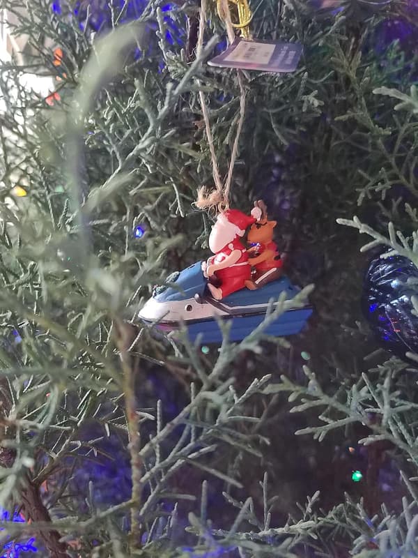 Jolly Santa Jet Ski Ornament with Reindeer
